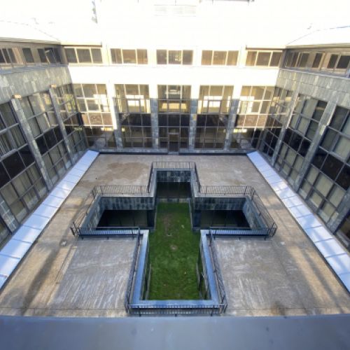 Reparación de cubiertas planas en la Facultad de Economía y Empresa, Oviedo, Asturias